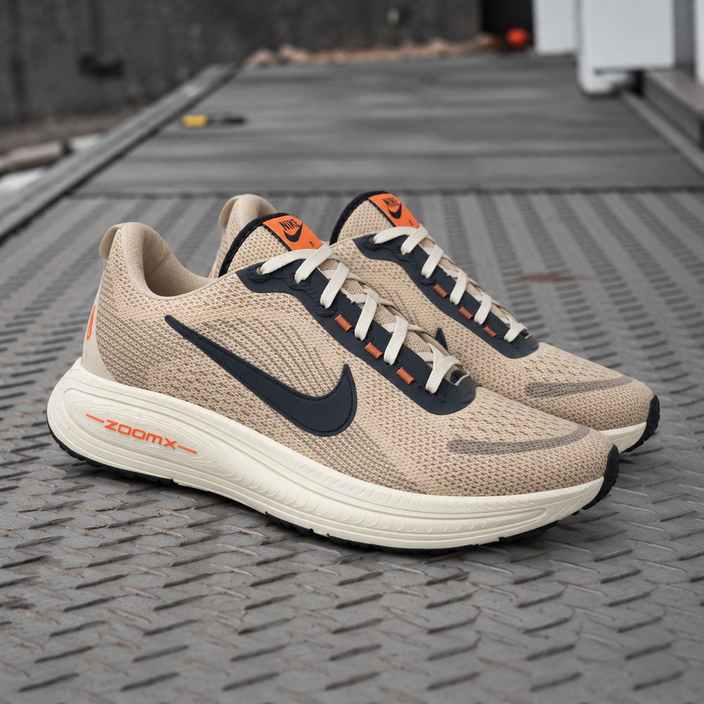 NIKE VOMERO 18 BEGE